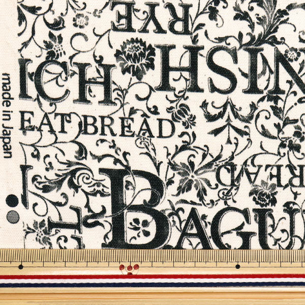 [Quantity starting from 5] Fabric 『Oxford Flower Letter Bread Kinari x Kuro YZ1019-C"