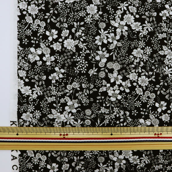 [From quantity 5] Fabric "60 loan FLOWNNYII retro small flower black NFA-1010-15D" KOKKA