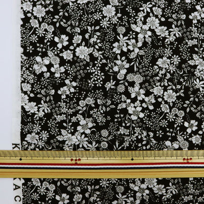 [From quantity 5] Fabric "60 loan FLOWNNYII retro small flower black NFA-1010-15D" KOKKA